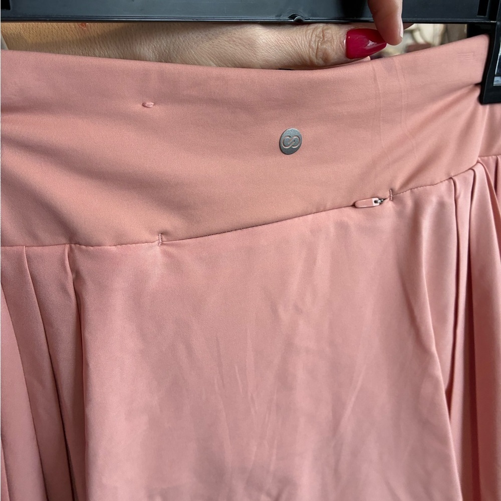 CALIA Women's 14" Side Pleat Court Skort in a pink color (Guava Pink) size M - Picture 4 of 5